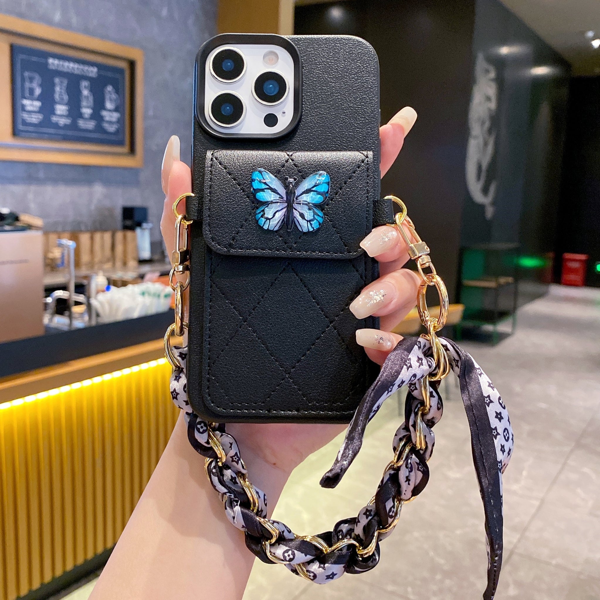 Butterfly Charm Black Leather Wallet Phone Case with Stylish Chain Strap For iPhone 16 Pro