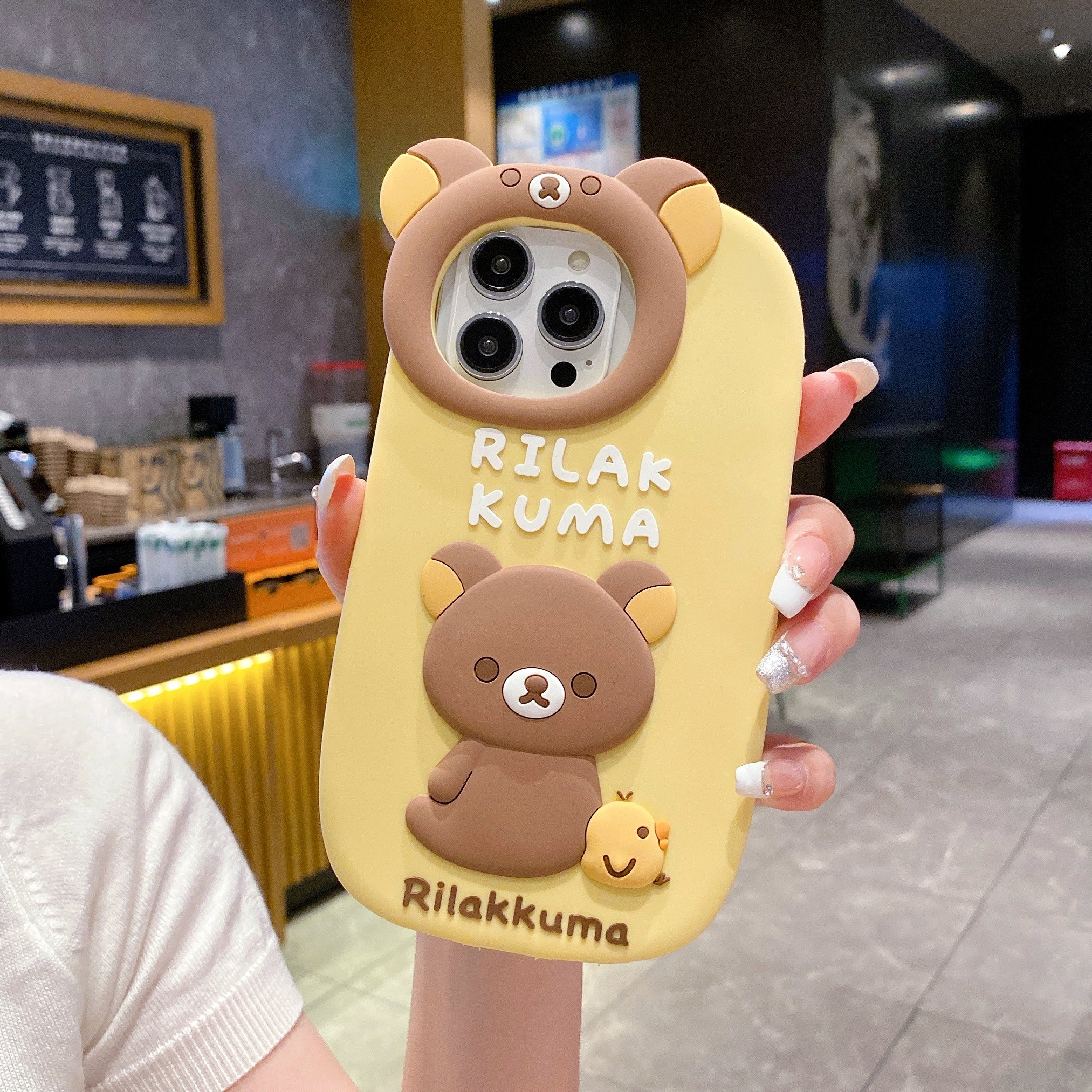 Yellow Lovely Chik Rilakkuma Bear Lens Frame Silicon Phone Cases For iPhone 14 Plus (Universal Camera Cut)