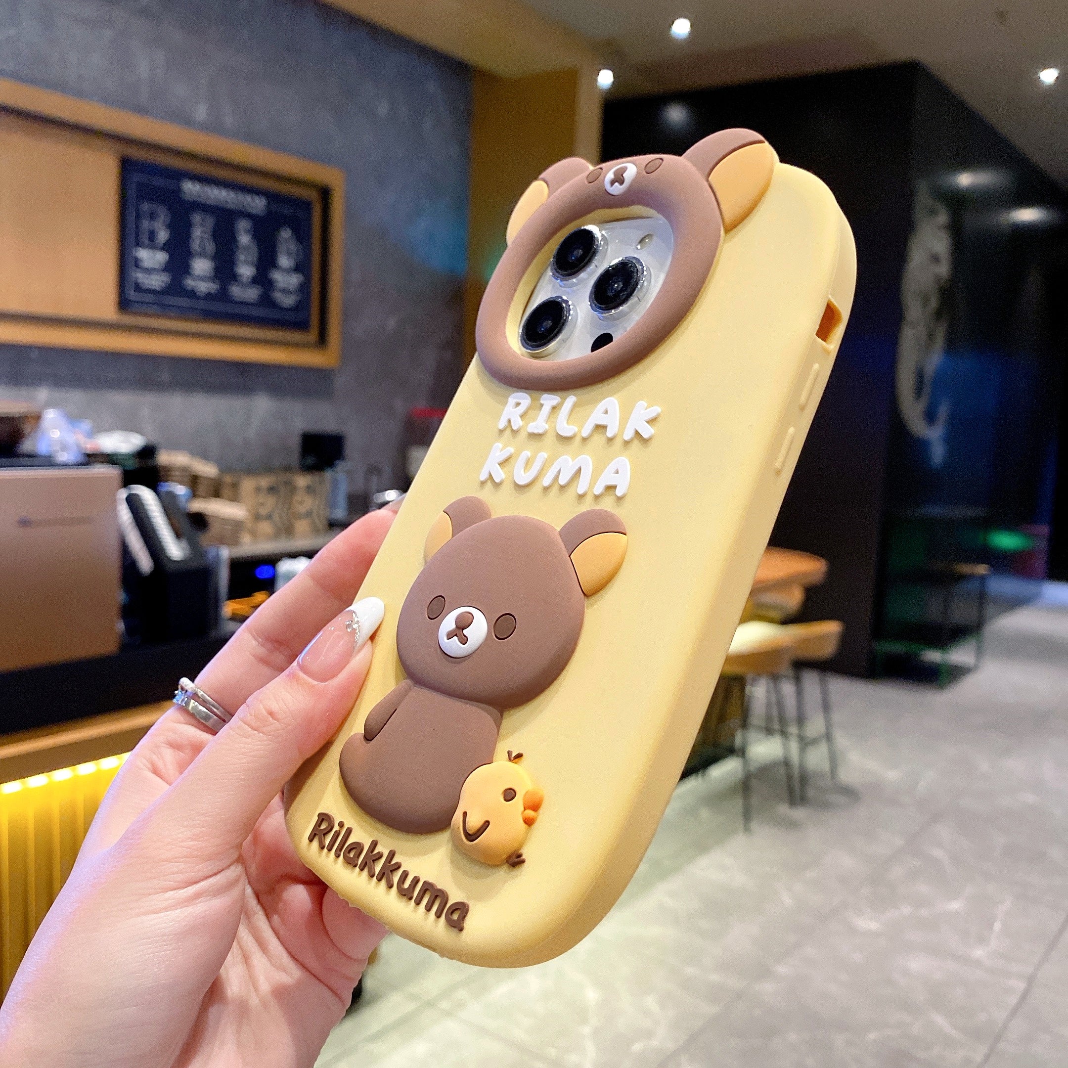 Yellow Lovely Chik Rilakkuma Bear Lens Frame Silicon Phone Cases For iPhone 14 Plus (Universal Camera Cut)