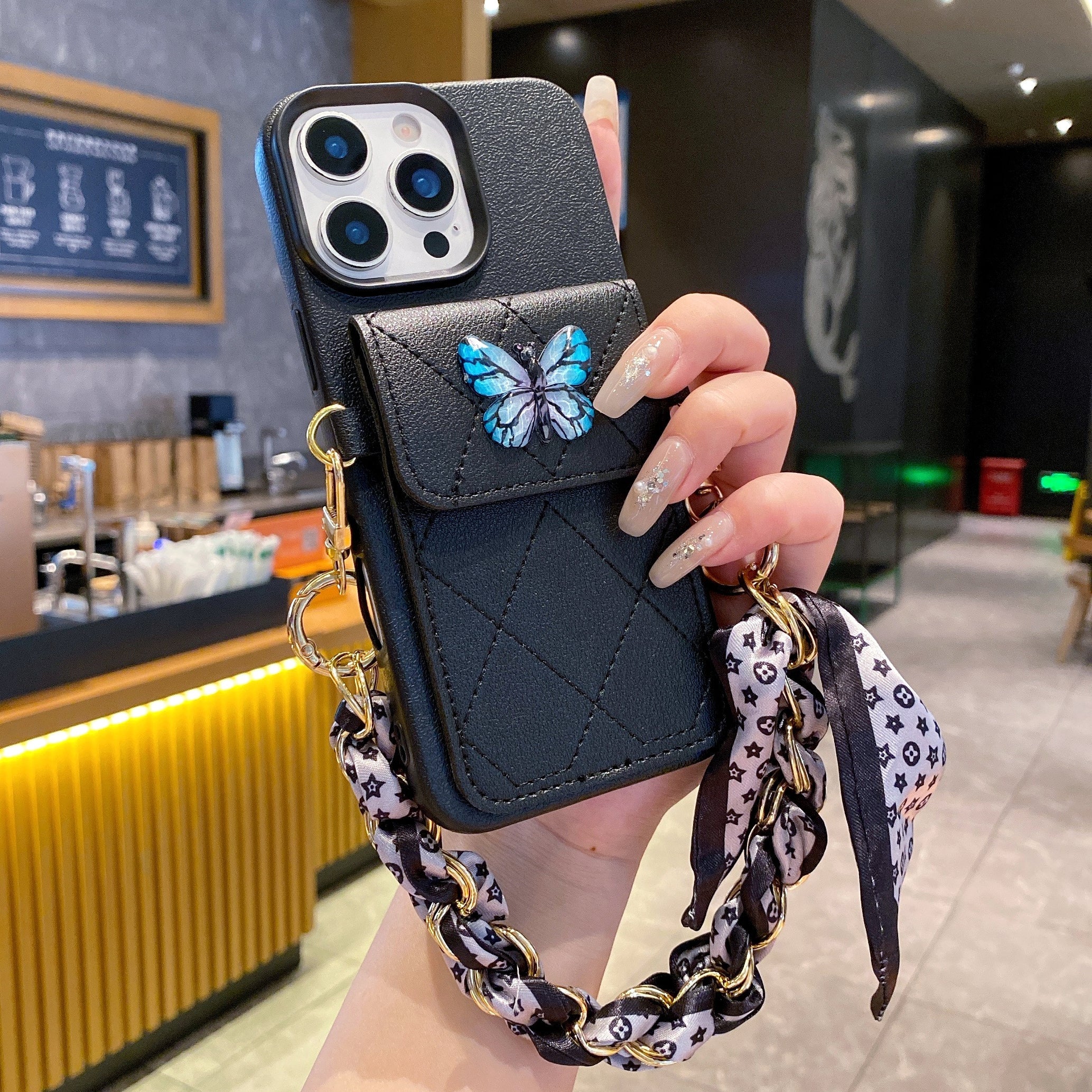 Butterfly Charm Black Leather Wallet Phone Case with Stylish Chain Strap For iPhone 17 Pro Max